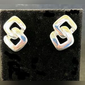 Chic Interlocking Modernistic -S Design Silver colored Earrings